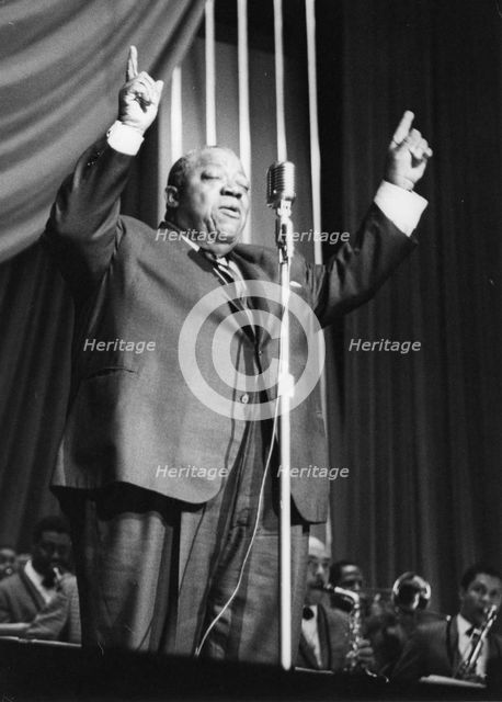 Jimmy Rushing and the Basie Band; with Frank Wess, London, 1963. Creator: Brian Foskett.