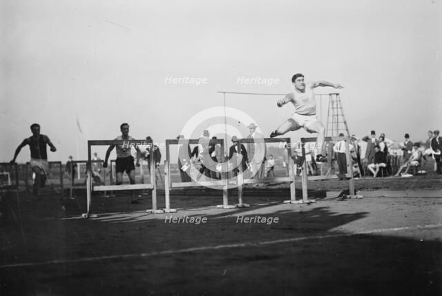 J.J. Eller wins 120 yd. Hurdle 1911, 1911. Creator: Bain News Service.