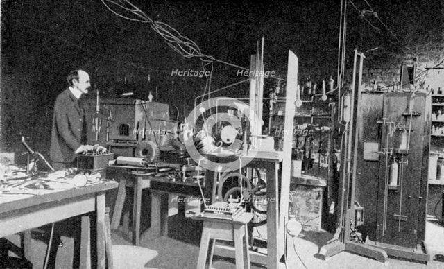 JJ Thomson, British physicist, at work in the Cavendish Laboratory, Cambridge. Artist: Unknown