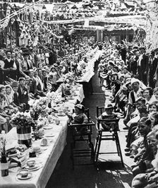 Jubilee tea party for children in Orville Road, Battersea, London, 1935