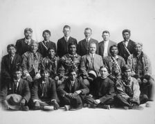 Judge James Wickersham in council with Indian chiefs, between 1900 and 1907. Creator: Unknown