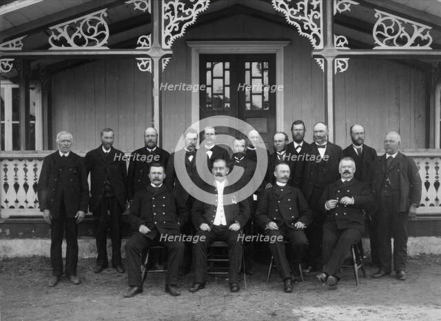 Judges, sheriffs and jurors gathered outside the courthouse for Västra Härad's trial...1900. Creator: Unknown.