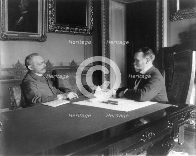 Jules Martin Cambron, 1845-1935, and John Milton Hay, 1838-1905, at exchange..., c1899 May 4. Creator: Unknown.