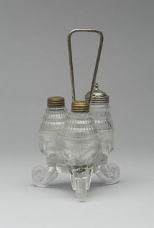 Jumbo/Elephant pattern cruet stand with three bottles, 1883/5. Creator: Canton Glass Company