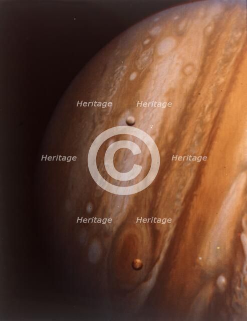 Jupiter, Io and Europa from 20 million kilometres.  Creator: NASA.