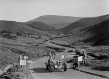 K Hutchison's winning Allard Special leading R Fielding's Jaguar SS at the Blackpool Rally, 1939. Artist: Bill Brunell