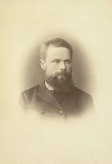 K Mikhailov, head-and-shoulders portrait, facing slightly right, between 1880 and 1886. Creator: Unknown