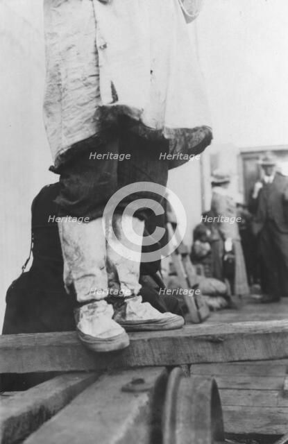 On a dock in Nome, between c1900 and 1916. Creator: Unknown.