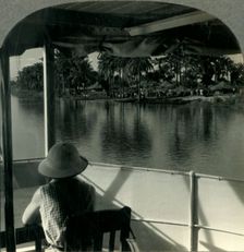 On a Steamer on the Lualaba River, Belgian Congo - A Native Village at the Water's Edge c1930s. Creator: Unknown