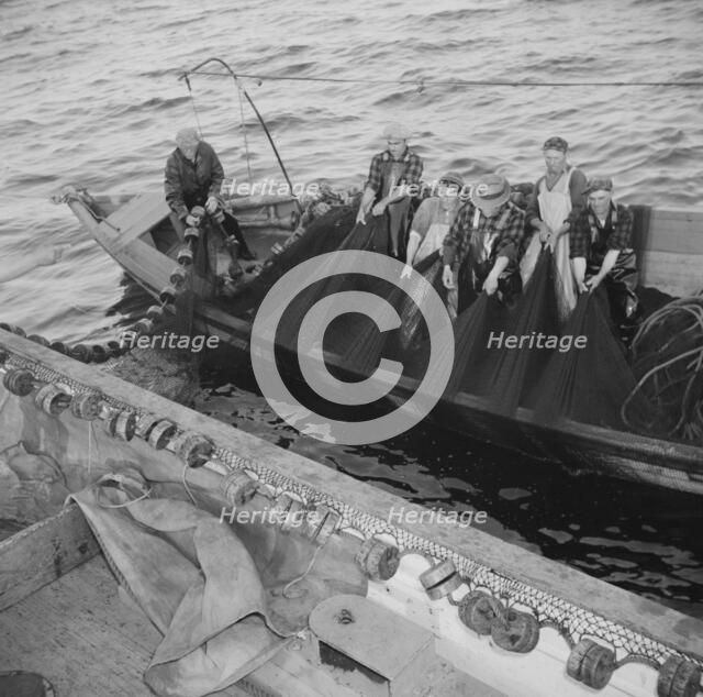 On board the fishing boat Alden, out of Gloucester, Massachusetts, 1943. Creator: Gordon Parks.