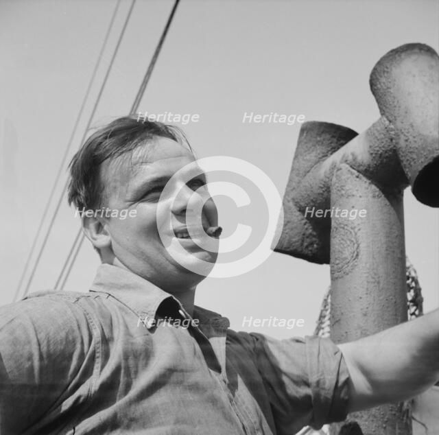 On board the fishing boat Alden, out of Gloucester, Massachusetts, 1943. Creator: Gordon Parks.