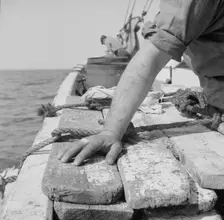 On board the fishing boat Alden out of Gloucester, Massachusetts, 1943. Creator: Gordon Parks