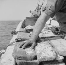 On board the fishing boat Alden out of Gloucester, Massachusetts, 1943. Creator: Gordon Parks