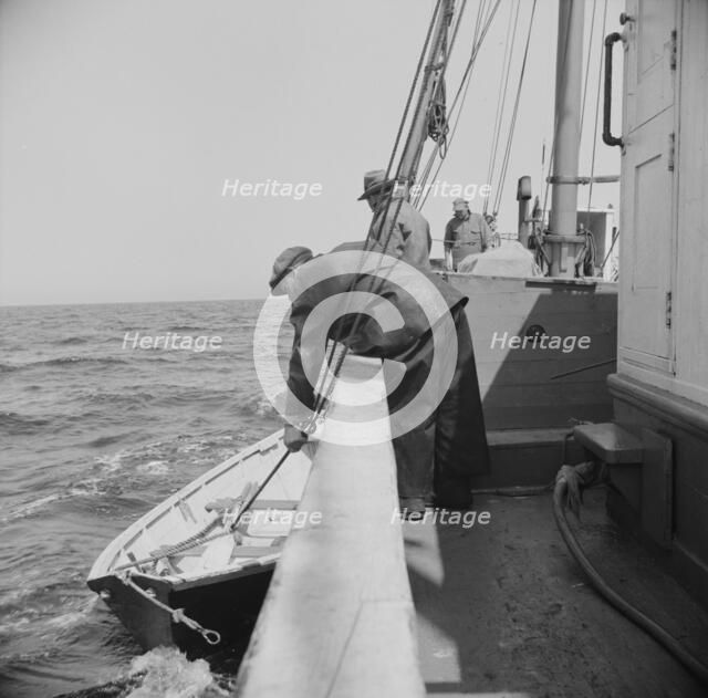 On board the fishing boat Alden, out of Gloucester, Massachusetts, 1943. Creator: Gordon Parks.