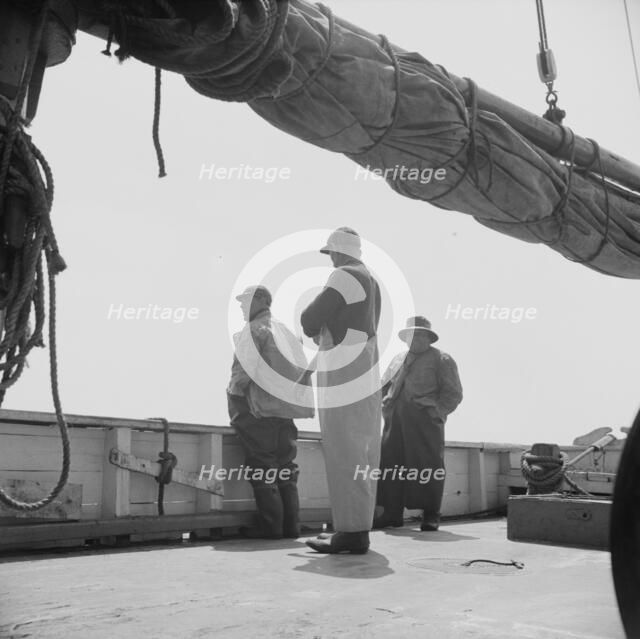 On board the fishing boat Alden out of Gloucester, Massachusetts, 1943. Creator: Gordon Parks.