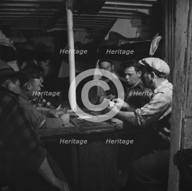 On board the fishing boat Alden, out of Gloucester, Massachusetts, 1943. Creator: Gordon Parks.