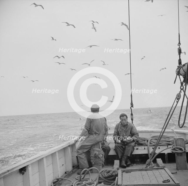 On board the fishing boat Alden, out of Gloucester, Massachusetts, 1943. Creator: Gordon Parks.