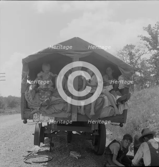 On highway no. 1 of the "OK" state near Webbers Falls, Muskogee County, Oklahoma, 1938. Creator: Dorothea Lange.
