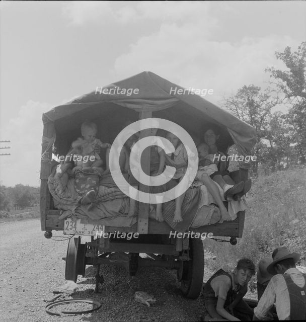 On highway no. 1 of the "OK" state near Webbers Falls, Muskogee County, Oklahoma, 1938. Creator: Dorothea Lange.