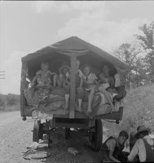 On highway no. 1 of the "OK" state near Webbers Falls, Muskogee County, Oklahoma, 1938. Creator: Dorothea Lange