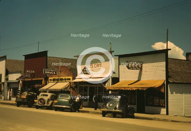 On main street of Cascade, Idaho ..., 1941. Creator: Russell Lee.
