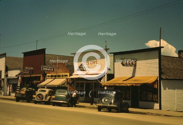 On main street of Cascade, Idaho ..., 1941. Creator: Russell Lee.