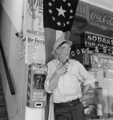 On main street of Williamette Valley town, Independence, Polk County, Oregon, 1939. Creator: Dorothea Lange