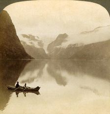On sombre Lake Olden, between cloud-covered mountains, to Maelkevold glacier, Norway 1905. Creator: Unknown