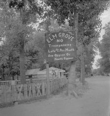 On the outskirts of a modern Oklahoma City within sight of its gleaming skyscrapers, 1936. Creator: Dorothea Lange