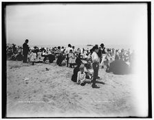 On the beach at Coney Island, between 1901 and 1906. Creator: Unknown