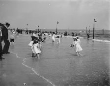 On the beach at Rockaway, N.Y., between 1900 and 1906. Creator: Unknown