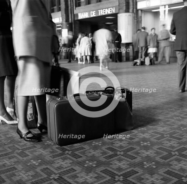 On the concourse of Centraal Station, Amsterdam, Netherlands, 1963. Creator: Michael Walters.