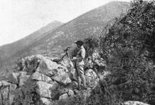 On the Eastern Front; An artillery observer in a position captured..., 1917. Creator: Unknown
