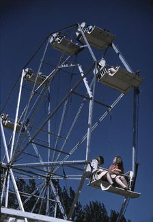 On the ferris wheel at the Vermont state fair, Rutland, 1941. Creator: Jack Delano
