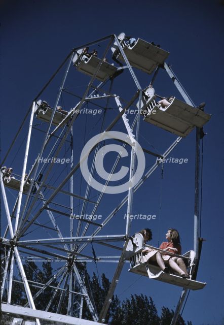 On the ferris wheel at the Vermont state fair, Rutland, 1941. Creator: Jack Delano.