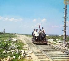 On the handcar outside Petrozavodsk on the Murmansk railway, 1915. Creator: Sergey Mikhaylovich Prokudin-Gorsky