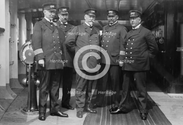 On the Imperator, Capt. H. von Meibom, Com. Ruser, Capt. A. Hoefer, Capt. H. Schetelig..., 1913. Creator: Bain News Service.