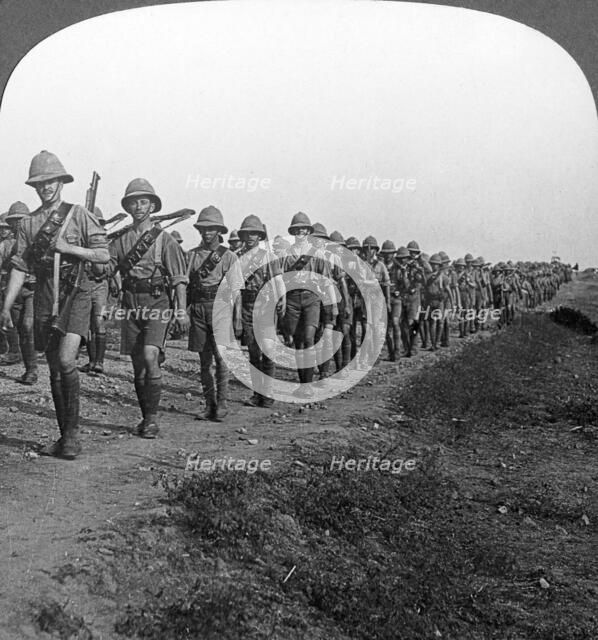 'On the long march through torrid heat to Baghdad', World War I, c1914-c1917. Artist: Realistic Travels Publishers
