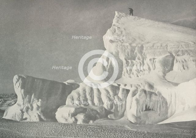 'On the Summit of an Iceberg', c1911, (1913). Artist: Herbert Ponting.