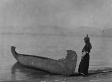 On the shore of the lake-Kutenai, c1910. Creator: Edward Sheriff Curtis