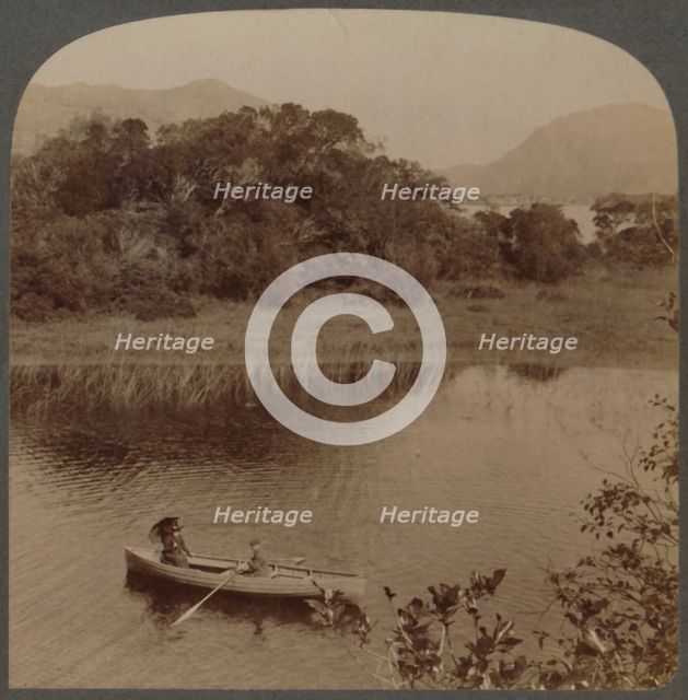 'On the Upper Lake of pretty Killarney, Ireland', 1901. Creator: Underwood & Underwood.