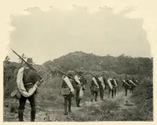 On the Way from Battlefield of 1st and 10th to "Rough Riders" Scene of Conflict, over the Mountains Creator: Burr McIntosh