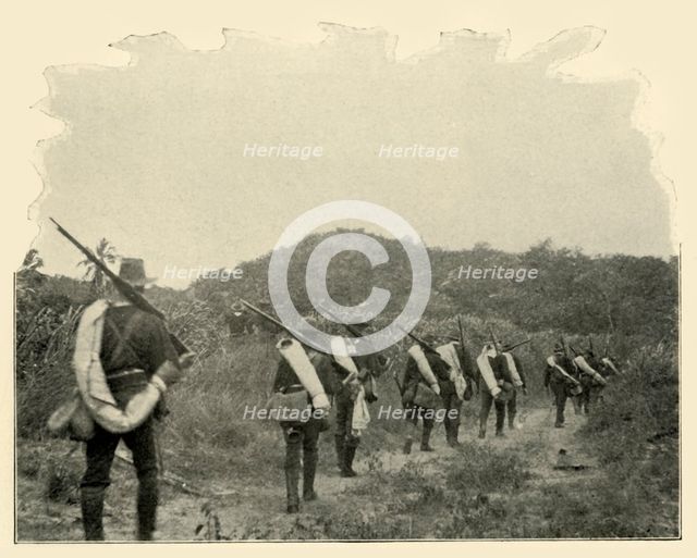 'On the Way from Battlefield of 1st and 10th to "Rough Riders" Scene of Conflict, over the Mountains Creator: Burr McIntosh.