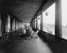 On the west veranda, Hotel Champlain, Bluff Point, N.Y., c.between 1910 and 1920. Creator: Unknown