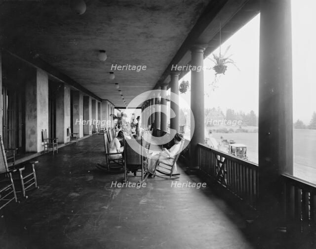 On the west veranda, Hotel Champlain, Bluff Point, N.Y., c.between 1910 and 1920. Creator: Unknown.