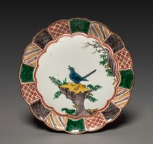One of a Pair of Dishes with Singing Bird on a Rock: In Ko Kutani Style, 18th century. Creator: Unknown