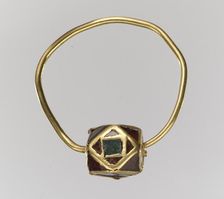 One of a Pair of Gold Cloisonné Earrings, Frankish, 500-550. Creator: Unknown