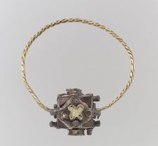 One of a Pair of Gold Earrings with Garnets, Frankish, second half 8th century. Creator: Unknown