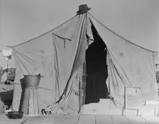 One of a row of tents, home of a pea picker, near Calipatria, Imperial Valley, CA, 1939. Creator: Dorothea Lange