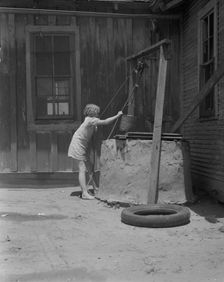 One of a Texas sharecropper's ten children, Hall County, Texas, 1937. Creator: Dorothea Lange